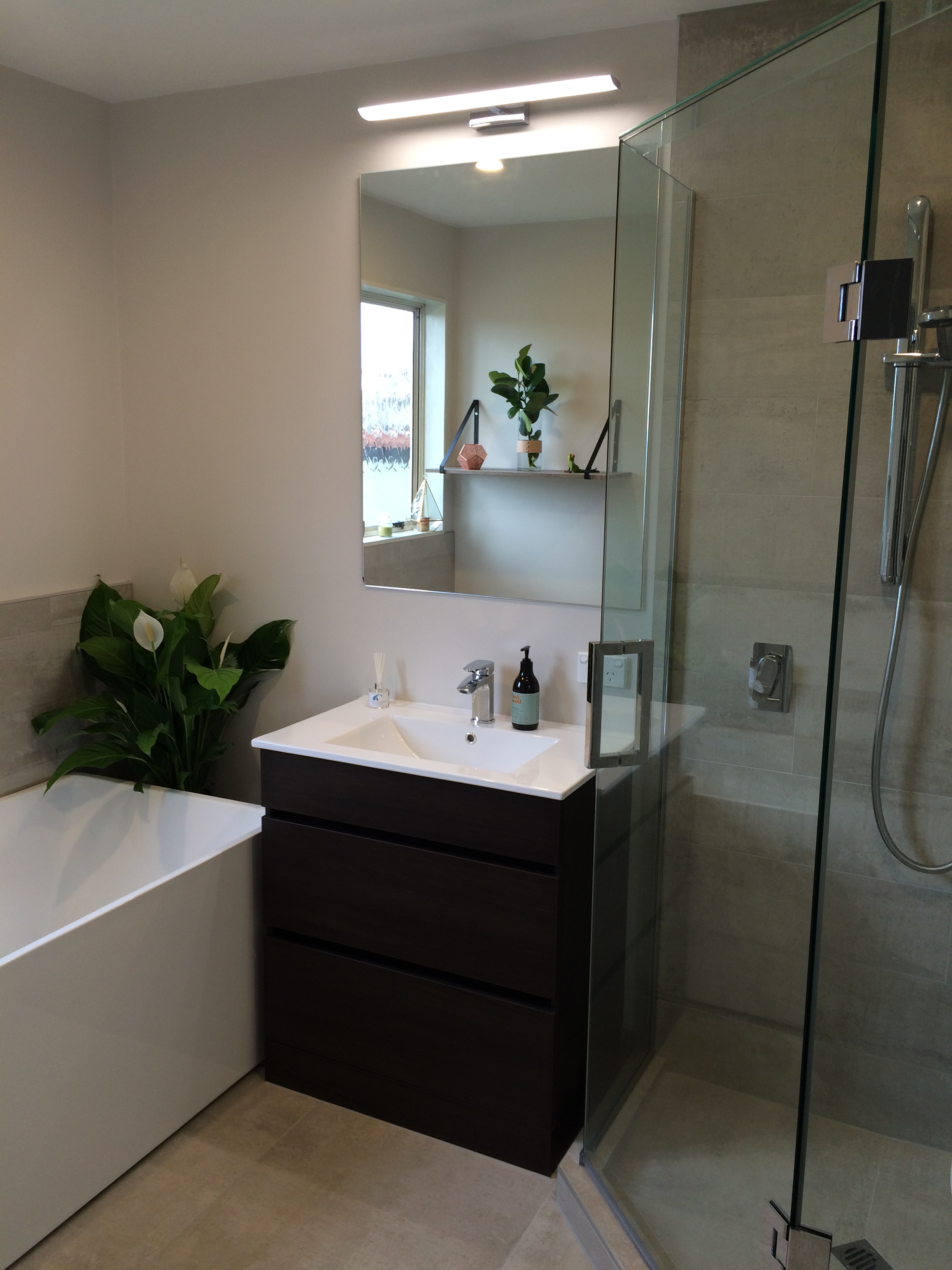Three Bathrooms and a toilet in Forrest Hill Bathroom renovation photo
